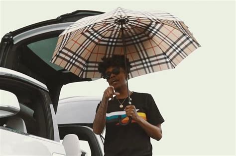 Lightshow Addresses the Haters in “Burberry Umbrellas” Video